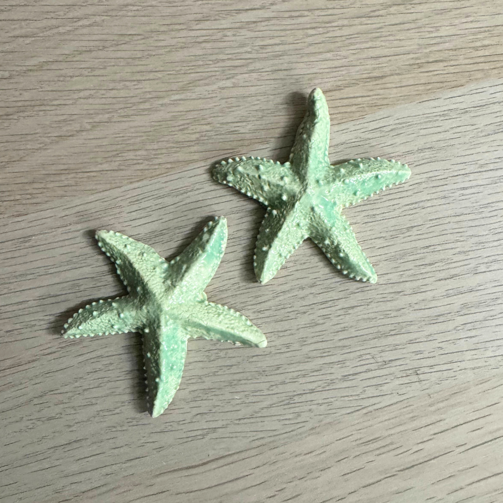 Green Starfish Ornament Decoration featuring two textured starfish with a soft green hue, ideal for aquarium or coastal-themed home decor.
