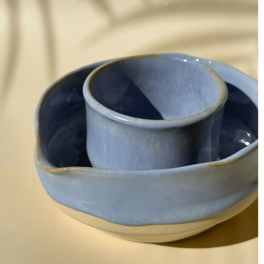 Lilac matcha bowl and cup set on a beige background