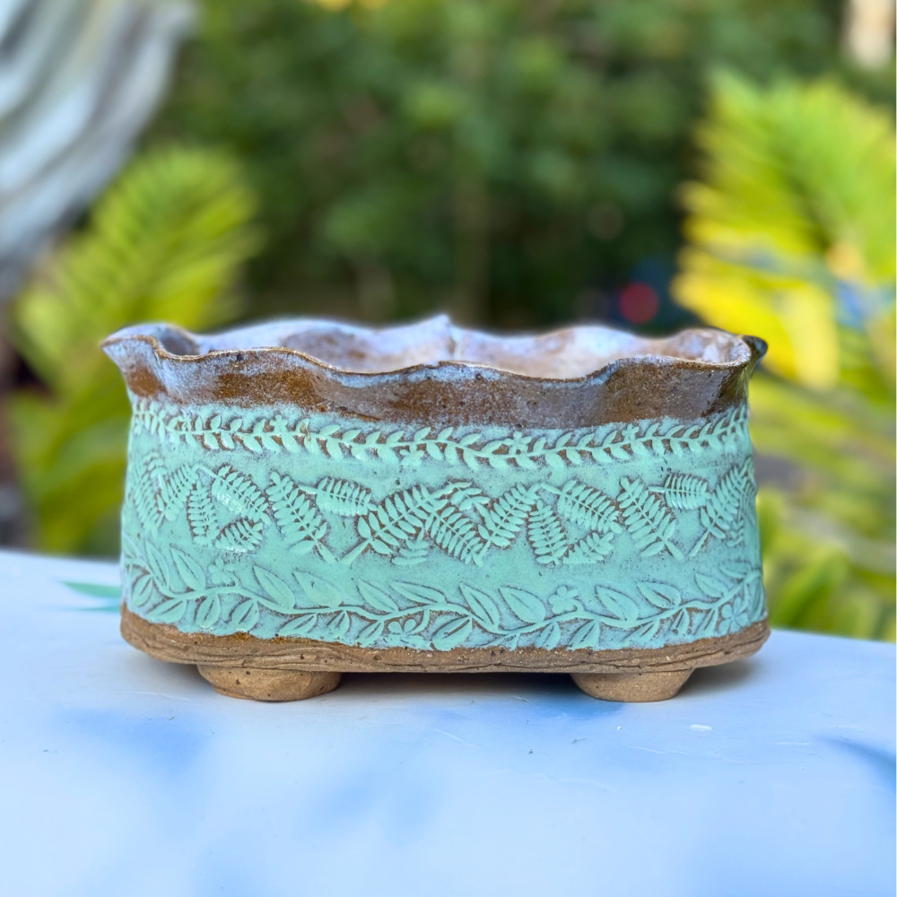 Green ceramic flower pot handcrafted in Australia