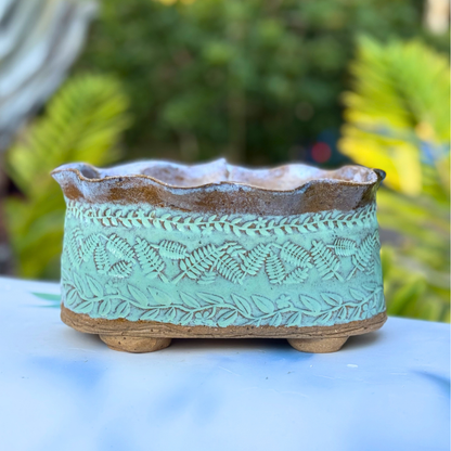 Green ceramic flower pot handcrafted in Australia