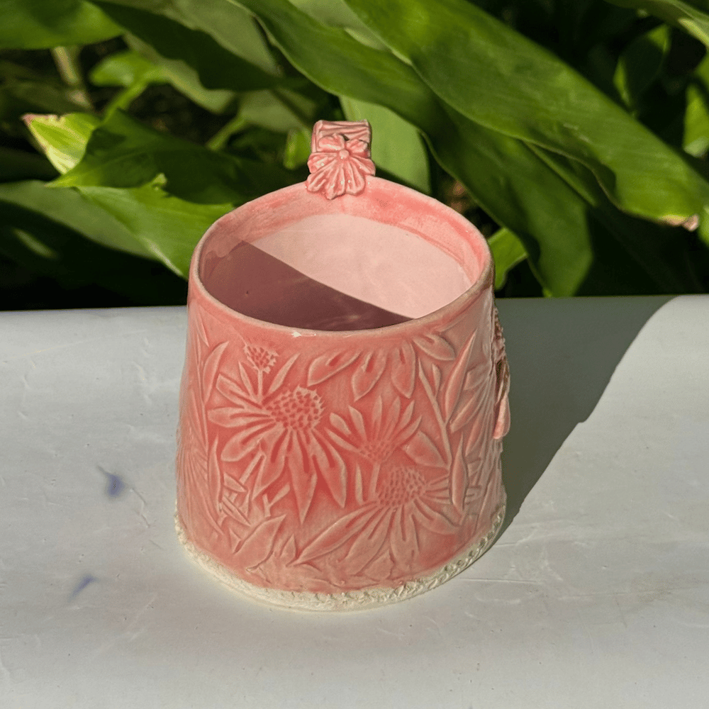 Pink ceramic hand made mug with floral patterns made in Australia