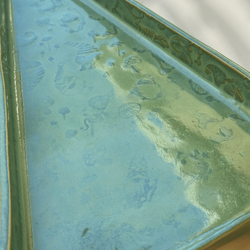 Close-up of a textured green surface with patterns