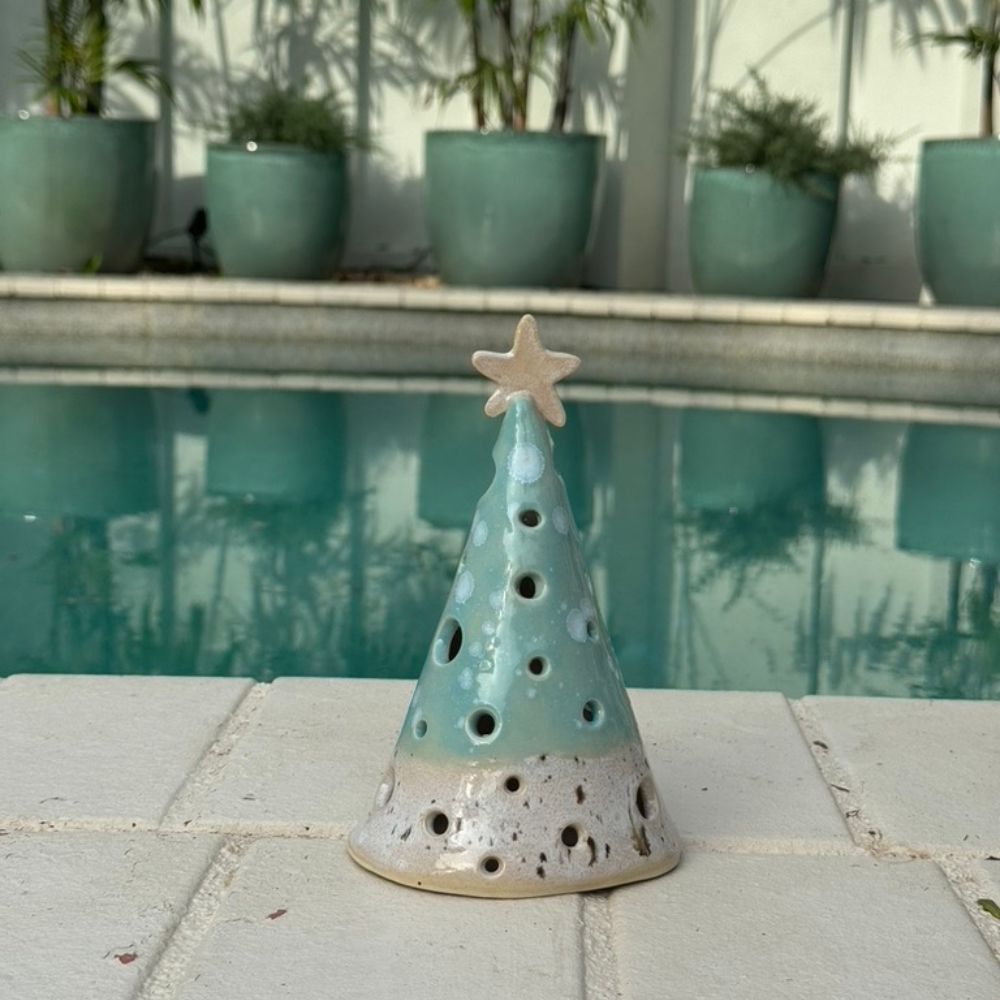 coastal christmas luminary cone poolside