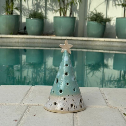 coastal christmas luminary cone poolside