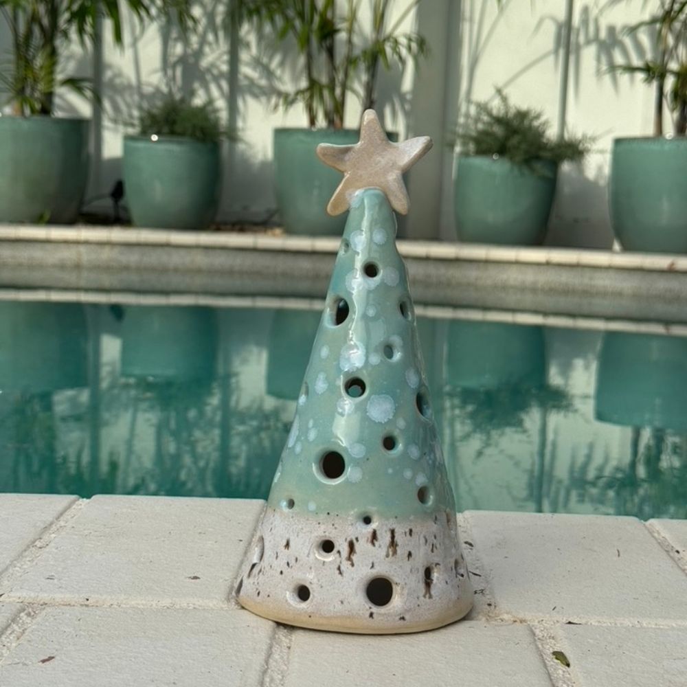 coastal christmas luminary cone poolside