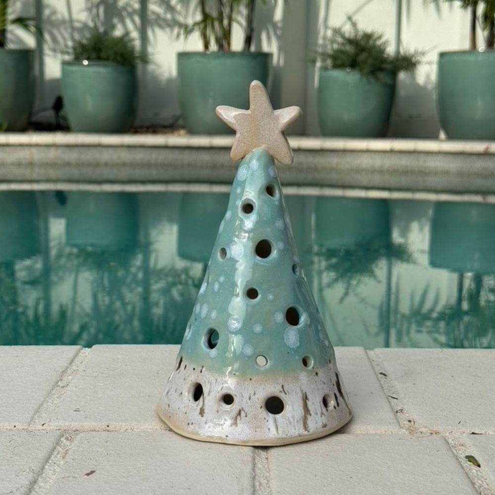coastal christmas luminary cone poolside