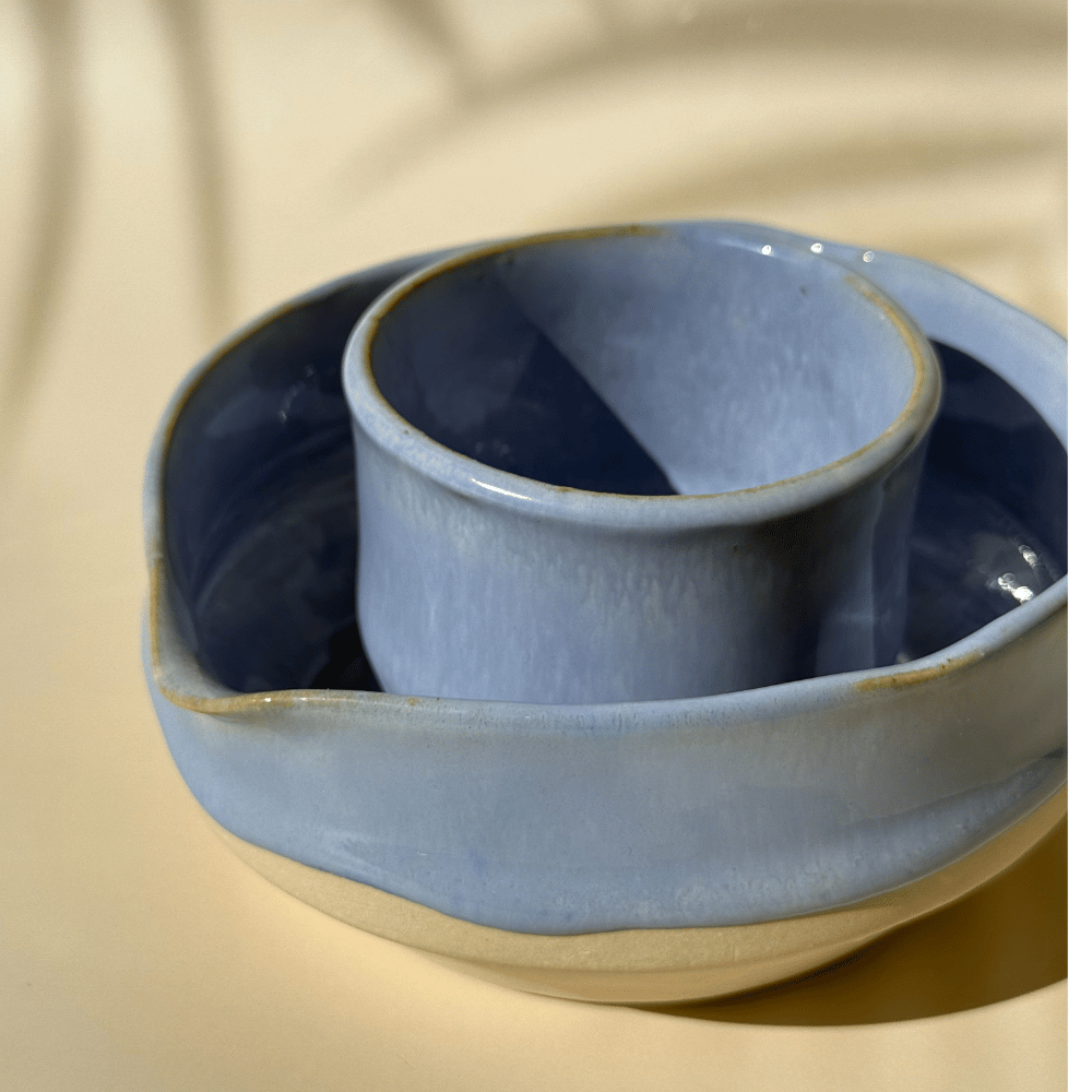 Lilac matcha bowl and cup set on a beige background
