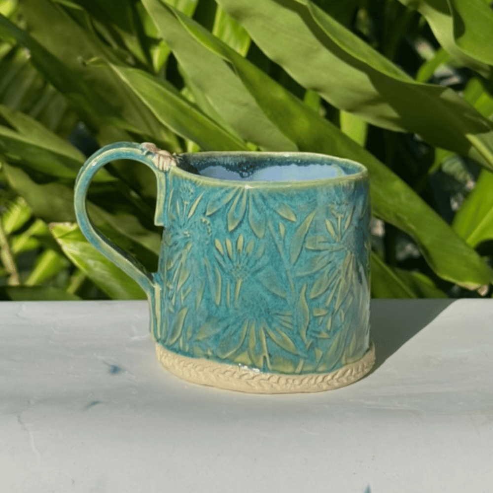 Artisan pottery mug with botanical texture handmade gifts australia