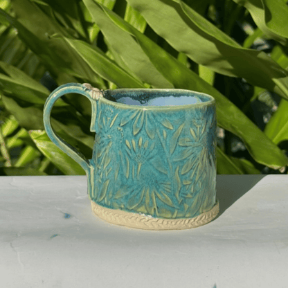 Artisan pottery mug with botanical texture handmade gifts australia