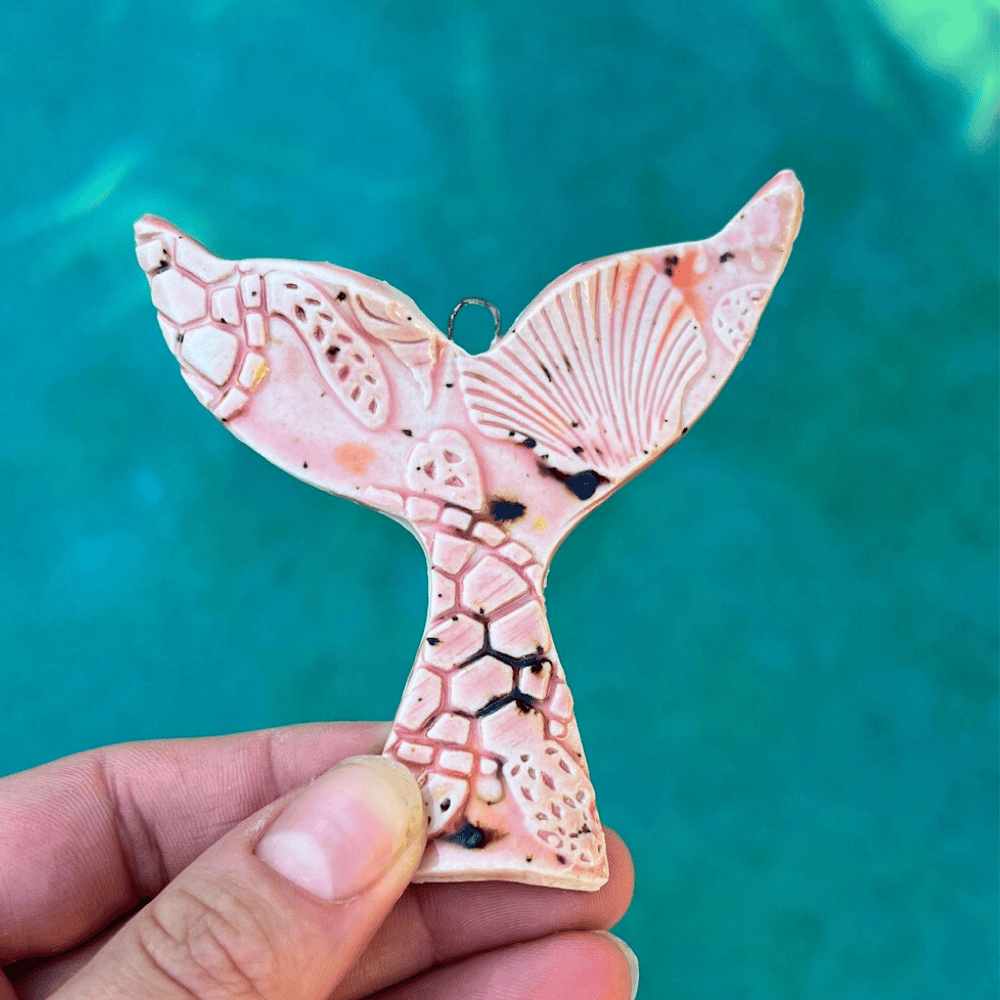 pink ceramic whale tail ceramic decoration wiht turtle print