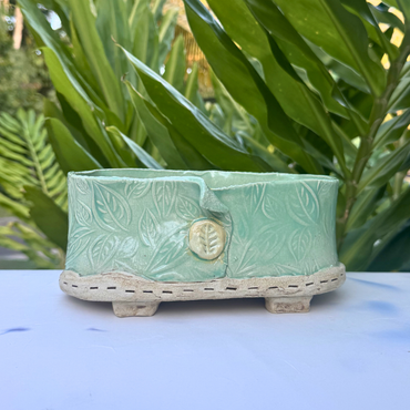 coastal style ceramic planter green leaf texture
