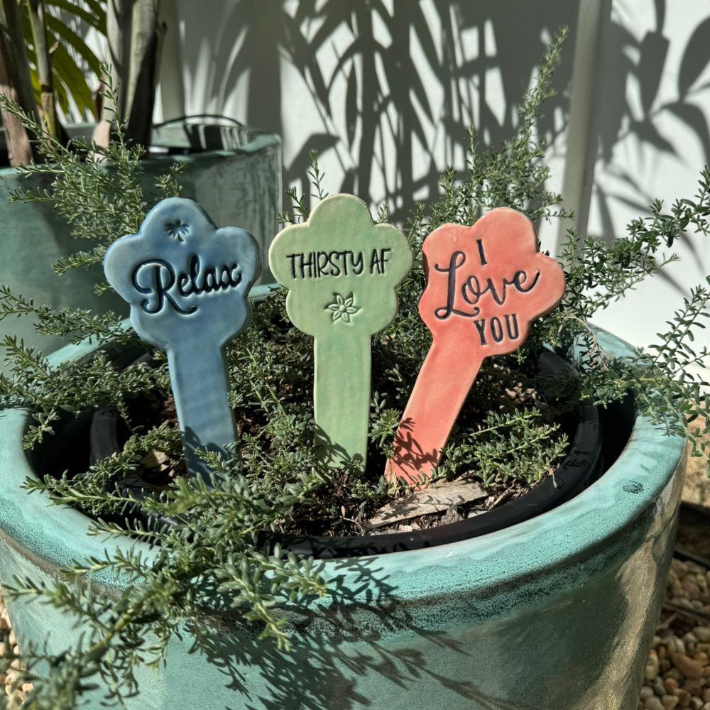Plant markers in a pot