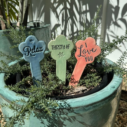 Plant markers in a pot