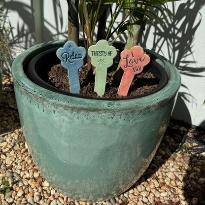 Plant markers in a pot