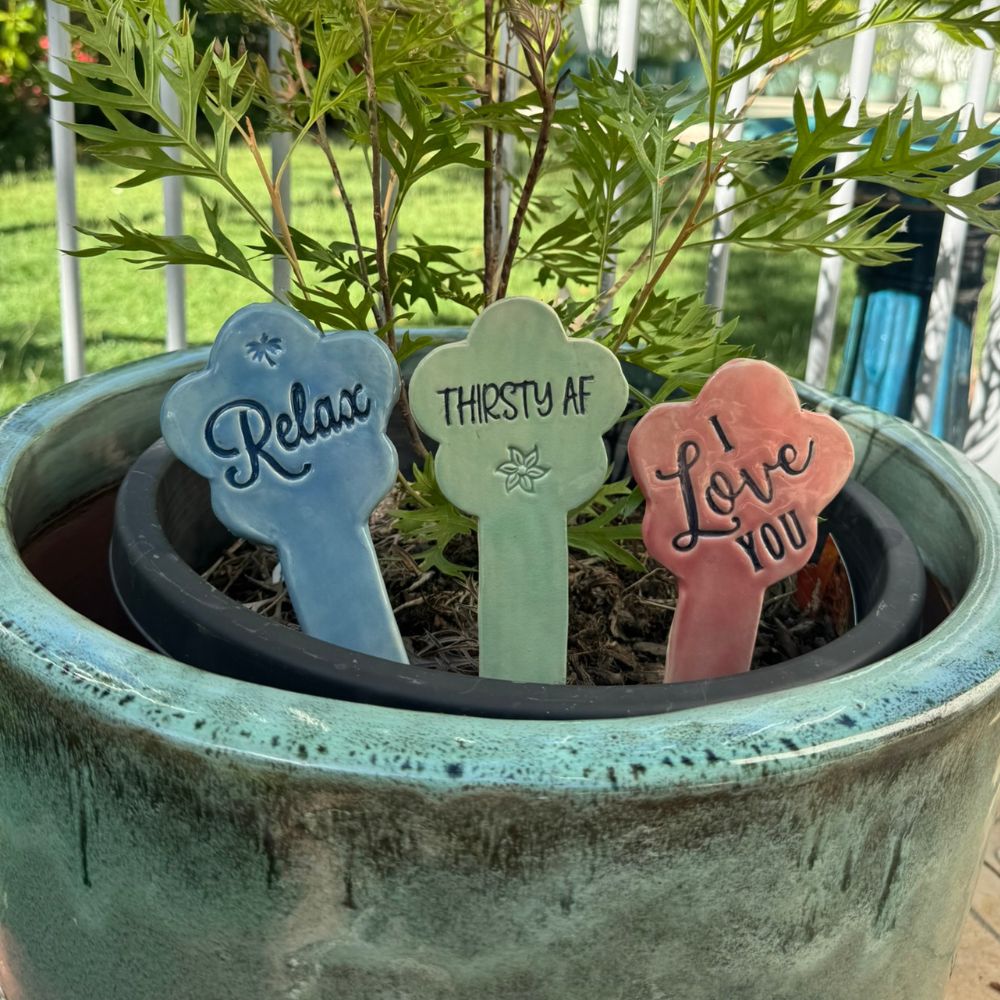 Plant markers in a pot