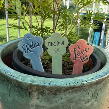 Plant markers in a pot