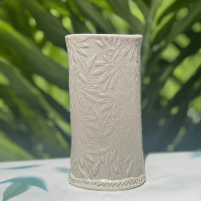 Handmade botanical ceramic vase with raised coneflower flowers Sunshine Coast pottery
